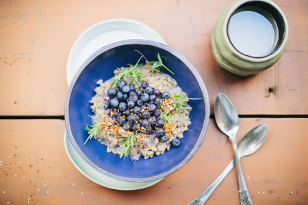 blueberries and oatmeal in breakfast bowlの素材