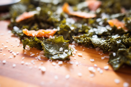close-up of seasoned kale chips with sea saltの素材