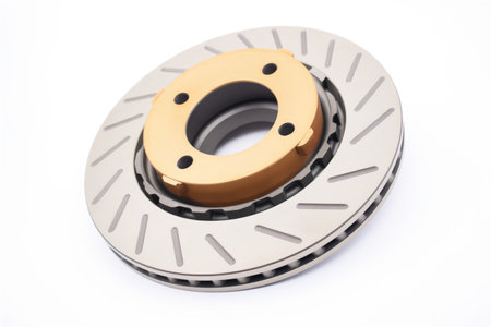 closeup of a new brake disc on a white backgroundの素材