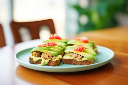 open-faced tempeh sandwich with avocado spread