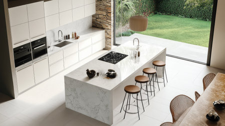 An aerial view of a modern kitchen with a large white island surrounded by bar stools, stainless steel fixtures, and expansive windows opening to a serene backyard.の素材