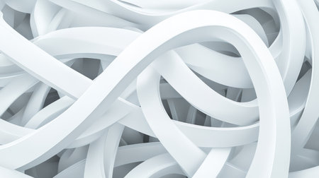 Abstract white 3D tubes intersecting and curving to form a complex and futuristic background with depthの素材