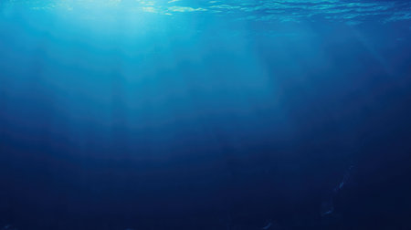 Deep blue sea gradient background flowing into a lighter aquamarine shade, no visible horizon or land.の素材