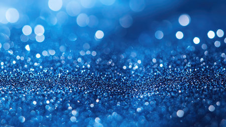 Close-up of a blue sea gradient background showing tiny shimmering details on the water's surface.の素材