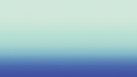 A minimalist gradient of a still ocean, moving from light aqua near the top to deep blue below.の素材