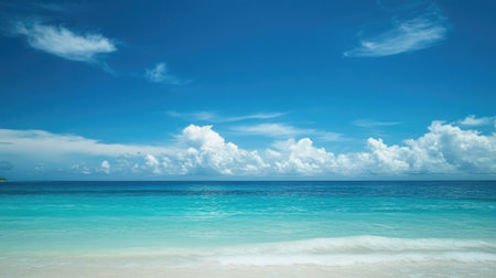 Minimalistic blue sea gradient background fading into a bright sky, with faint clouds on the horizon.の素材