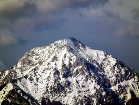 High mountains covered with snowの写真素材