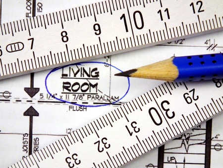 Pencil, blueprint of new house and wooden meter