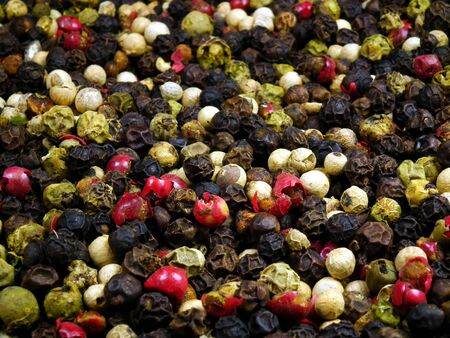 Black, red, green and white dried pepper