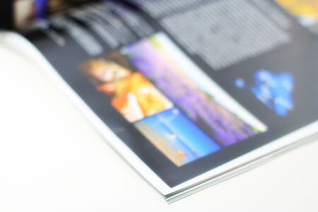 A colored magazine on white background の写真素材