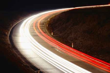 Lights of cars on the road at night の写真素材