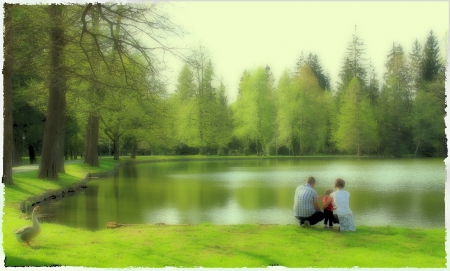 Happy familiy in the park の写真素材