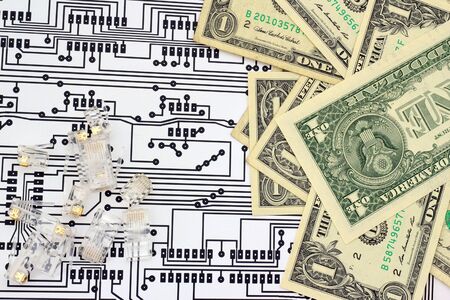 Paper money, jacks and circuit board schema の写真素材