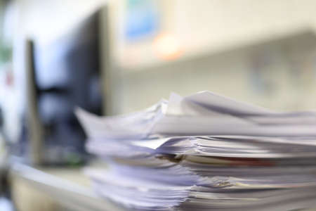 Pile of documents, files, unsolved work, papers.の写真素材