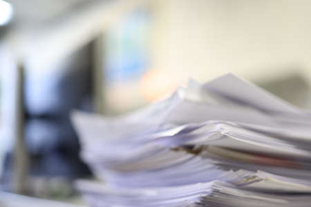 Pages of documents close up. Stack of files. Not solved papers, documentation, work, office.