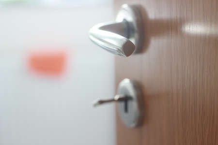 Close-up of the handle of a door with a blurred backgroundの写真素材