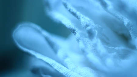 Macro shot of a light blue fabric. Abstract background. Soft focus.の写真素材