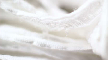 Close up of white fabric texture background. High resolution photo. Full depth of fieldの写真素材