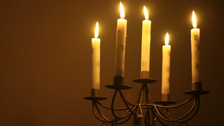 Old candle stick and candles burning down.の写真素材