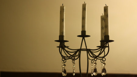 Old candle stick and candles burning down.の写真素材