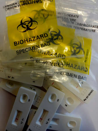Closeup of test tubes with blood samples for presence of coronavirus (COVID-19).