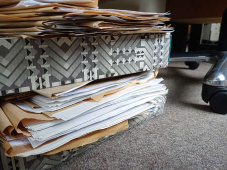 Pile of papers and folders in office, closeup. Space for text