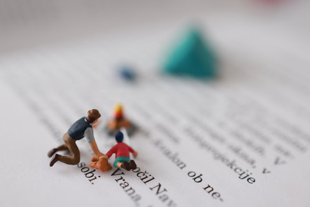 Miniature people : businessman running on the book. Image use for business concept.
