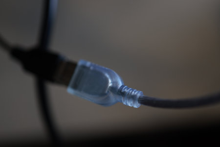 Close up of USB cable in a black background. Selective focus.の写真素材