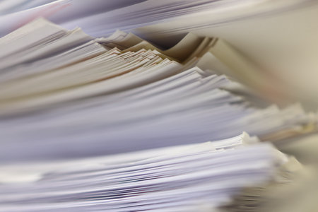 close up of a stack of documents in a office - shallow depth of fieldの写真素材