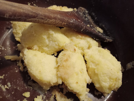 Potato dumplings in a frying pan. Toned.
