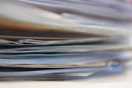 Close up of a stack of magazines. Shallow depth of field.の写真素材