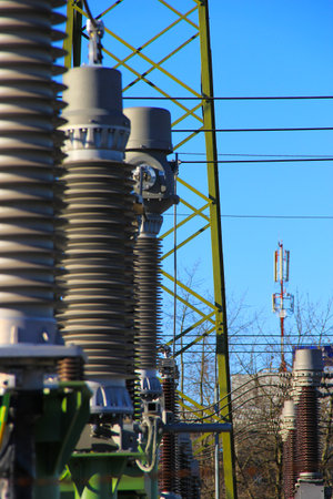 High voltage insulators and wires of high-voltage substation.