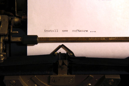 Vintage typewriter with a sheet of paperの写真素材