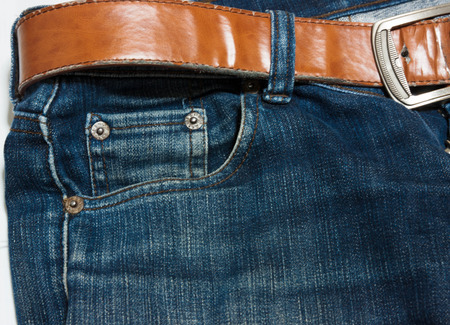 Jeans, brown belt  The dark の写真素材