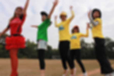 Woman jumps background blur.の写真素材