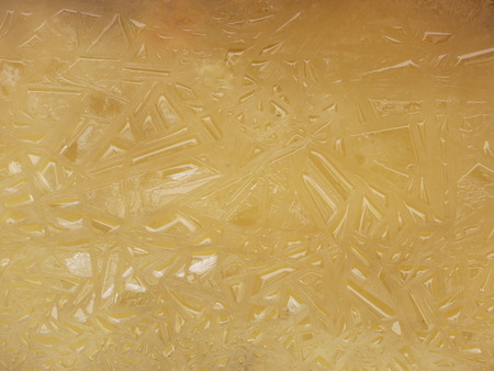 Ice patterns on some frozen water in winterの写真素材