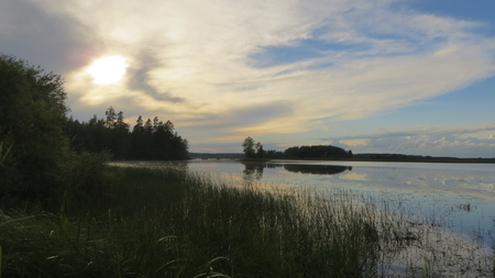 Lake on a sunset on a summer dayの写真素材