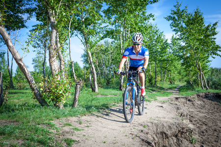 Training on a mountain bike cross-countryの写真素材