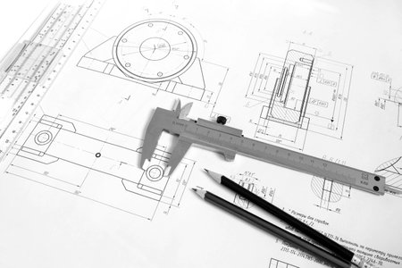Drawing of the bearing housing with vernier calipers and pencilsの写真素材
