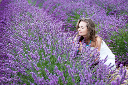 Beautiful girl in a lavenderの写真素材