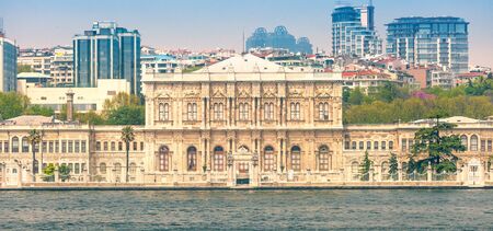 Dolmabahce Palace in the background of modern Istanbulのeditorial素材