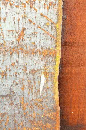Background vertical image as a steel sheet coated with rustの写真素材