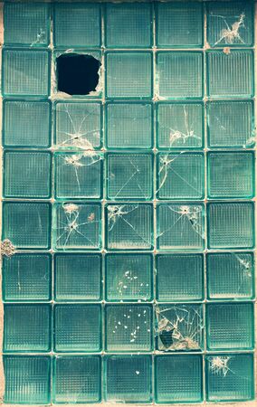 Background in the form of stained glass with broken glassesの写真素材
