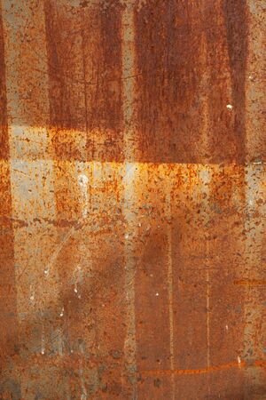 Background vertical image as a steel sheet coated with rustの写真素材