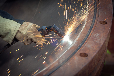 Sparks during cutting of metal manual plasma cutting machineの写真素材