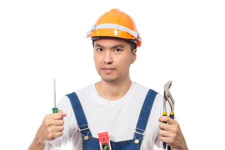 portrait of asian friendly & smiling handsome craftsman with repairing tools, isolated on white. Home Improvement, Renovation Set and DIY conceptの写真素材