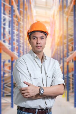 asian handsome store manager in warehouseの写真素材
