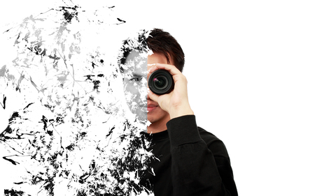 crumbling asian handsome man see thru camera lens, isolated on white & modern art portrait photo conceptの写真素材