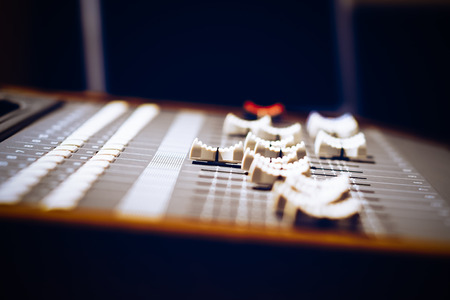 sound mixer fader, shallow dept of field. music concept