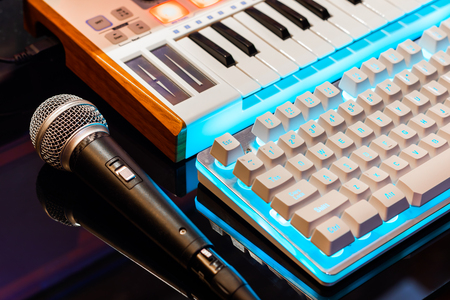 microphone, midi keyboard controller and computer keyboard. home recording studio conceptの写真素材